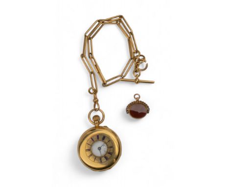 British, Late 19th century, An 18 carat gold half hunter pocket watch with white enamel dial and black enamel roman numerals 