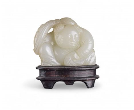 Chinese 19th Century Whitish mutton fat jade boy and carp Property of a gentleman From the collection of Peter Roe