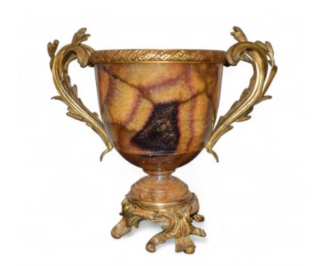 A magnificent Blue John urn Of yellowish and pale purple hue. With ormolu rope twist lip and foliate ormolu decorative handle