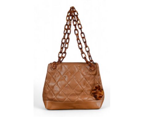 Circa 1995, Chanel A caramel quilted lambskin CC shoulder tote bag with faux tortoiseshell handles  Dimensions: 10 in. (H) x 