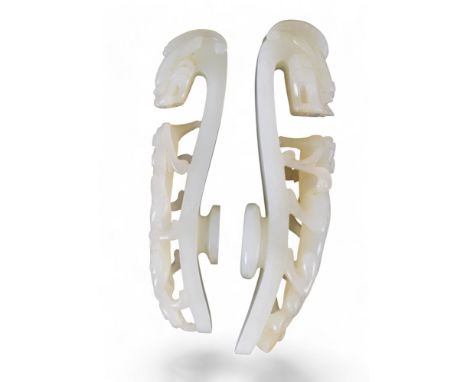 Chinese 18th century or earlier Two belt hooks with kylia, in white jade Property of a gentleman&nbsp; From the collection of