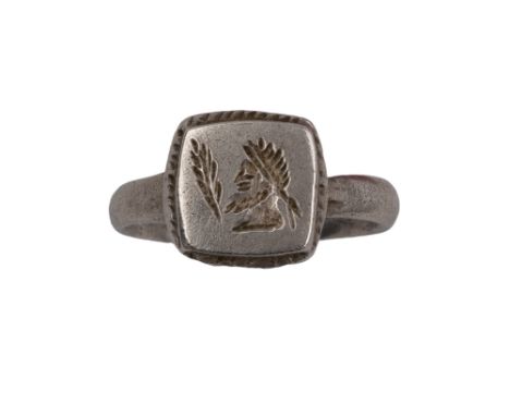 Roman Ancient A silver intaglio signet ring The cushion shape top intaglio carved with a male head in profile with laurel wre