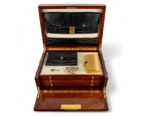 ChaumetA burr walnut presentation vanity case, presented to Baroness Thatcher by King Hassan II of Morocco. The case with thr