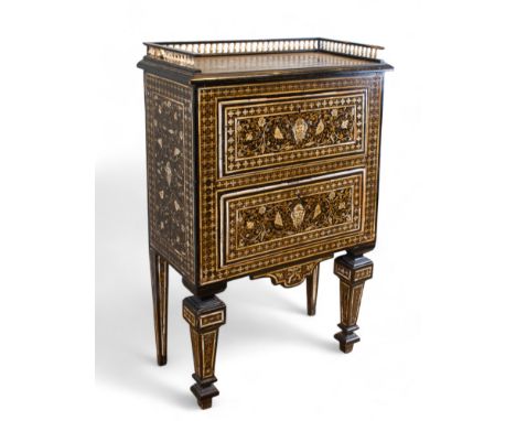 Italian 17th century A small, fine two drawer commode, in ebonised wood with inlay ivory Dimensions: 35 in. (H) x 22 in. (W) 