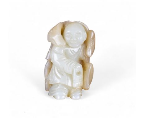 Chinese 19th century Brown and mutton fat coloured jade boy carrying a deer Property of a gentleman From the collection of Pe