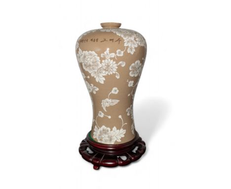 20th Century, Korean A white slip-decorated vase with peony design Provenance: Margaret Hilda Thatcher, Baroness Thatcher,&nb