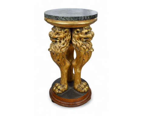 English 19th Century A giltwood marble top tripod pedestal table The circular marble top supported by three lion's heads on p