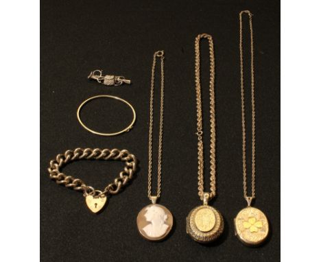 A silver curb link bracelet, heart padlock clasp, London 1976; a silver locket on rope twist necklace; another similar; a whi