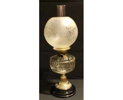A late 19th century oil lamp, twin Veritas burner, clear glass reservoir, spherical acid etched shade, brass support, 55cm ov