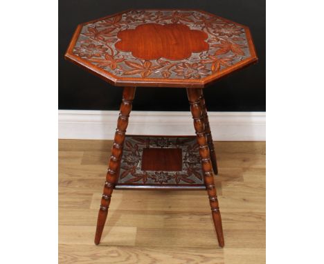 An early 20th century mahogany occasional table, octagonal top carved with flowers and foliage, bobbin-and-dart turned legs c