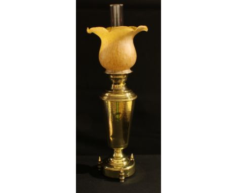 A late 19th century brass oil lamp, twin burner, opaque frosted orange flute glass shade, 66cm overall 