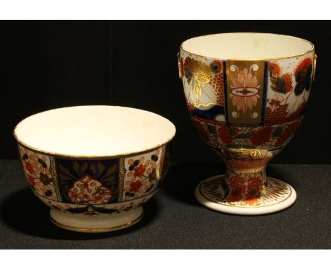 A Coalport Imari pedestal cup, richly painted and gilt, 16cm high, c. 1810; a similar slop basin, slightly later, c. 1820, [2