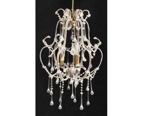 A three light electrolier, bronzed metal with glass swags and droplets 