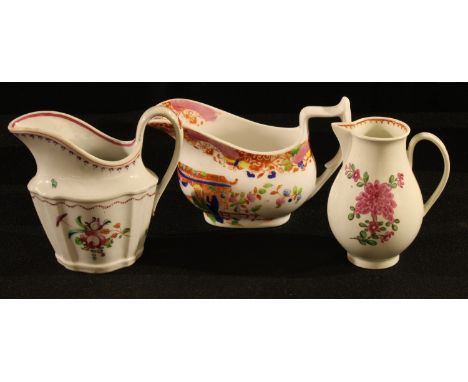 A Worcester sparrow beak jug, the baluster painted in the famille rose palette, hatched rim, scroll handle, 10cm high, c. 177