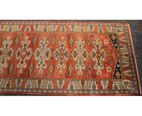 A Middle Eastern carpet runner, 345cm long x 91cm wide 