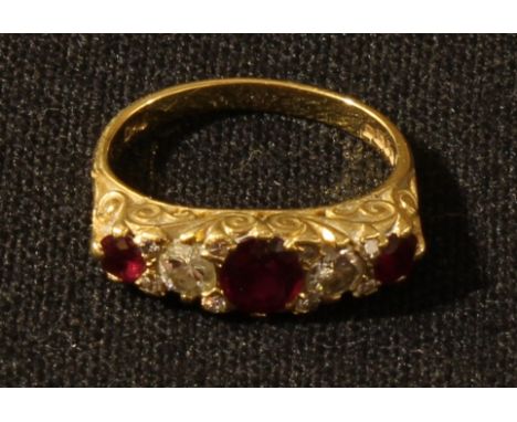 An 18ct gold diamond and ruby ring, size O, 5.5g 