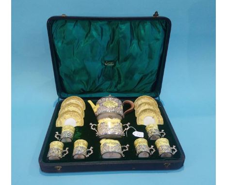 A Staffordshire 'Egg Shell' tea service with silver mounts