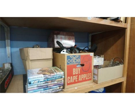 Shelf of assorted books and glass etc.