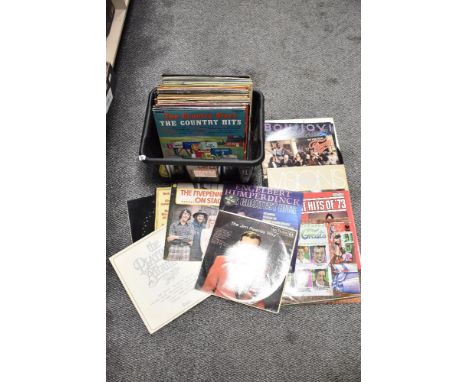 Two boxes of vintage vinyl albums and 75rpm singles