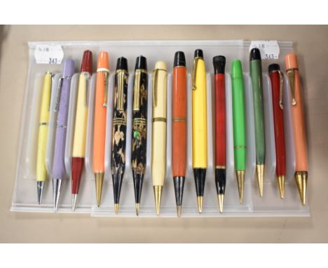 Fourteen vintage propelling pencils by various brands