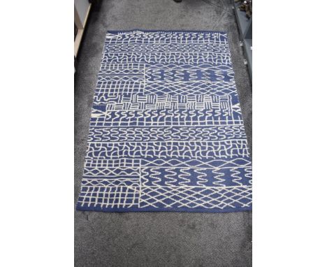 A vintage Afghan hand woven blanket in a heavy wool with blue geometric pattern 180cm x 125