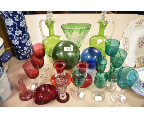 A selection of Art Glass wares including two apple green decanters, fishing floats, ruby candle sticks etc.