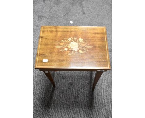 A vintage Sorento style inlayed sewing table with musical top.