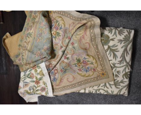 A selection of vintage crewel work throws and similar felted throw.