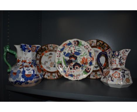 A selection of early 20th century ceramics including two Mason's water jugs and two Ashworth Ironstone plates