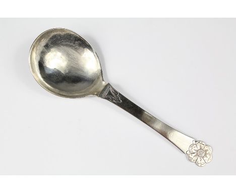 An 18th Century Silver Marriage Spoon, the spoon with deep bowl engraved to verso FBS &amp; TAD dated 1733, with a floral fin