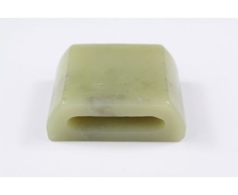A Chinese Carved Celadon Green Jade Belt Loop. The belt loop rectangular in design, approx 4 cms w x 5.5 cms h.