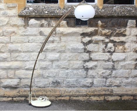 A Mid 20th Century Harvey Guzzini Arc Lamp. The arc lamp is one of the first made having a brass support and globular white s