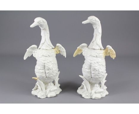 A Pair of 18/19th Century Porcelain Flasks. The flask in the form of Indian Runner ducks, approx 24 cms. ( the flasks have be