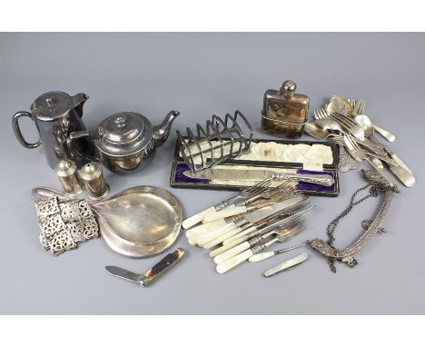 Miscellaneous Silver Plate. This lot includes silver handled cake knife, mother of pearl fruit knives and forks (6), gentlema