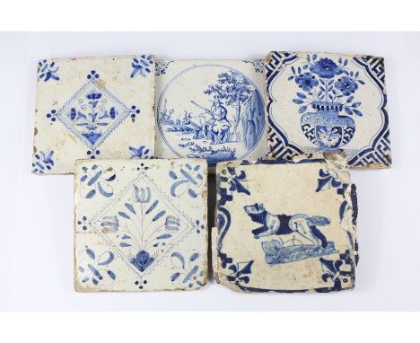 Four 17th Century Blue and White Delft Tiles. The first tile painted with a pastoral scene and the other three with floral sc