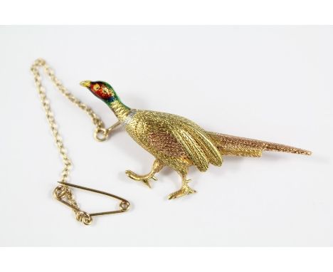 A 15ct Tri-Gold and Enamel Pheasant Brooch. The brooch approx 50mm l, approx&nbsp; 5.2 gms.
