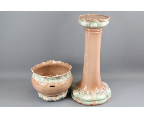 Blakeney Stoke on Trent Ceramic Jardiniere, with peach-coloured glaze, approx 58 cms with a stand approx 22 cms.