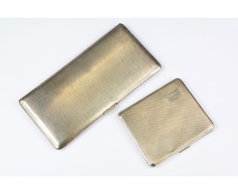 A Silver Double Cigarette Case. The case engine-turned and stamped with Birmingham hallmarks, dated 1948, mm John Rose, appro