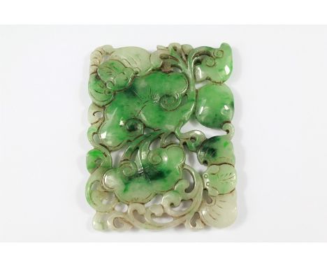 A Chinese Green Carved Jade Square Amulet. The amulet with carving depicting a mouse amongst flowers, approx 5 x 7 cms.