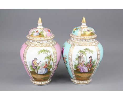 Two 19th Century Dresden Jars and Covers. The first vase hand painted with floral spray in pale pink reserves and lovers in a