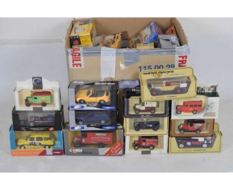 Mixed quantity of boxed diecast model vehicles to include; Vanguards, Matchbox Models of Yesteryear, Corgi, Burago, etc. 