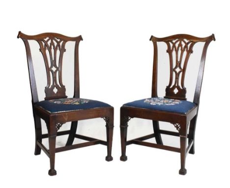 Pair of mahogany dining chairs both having tapestry floral spray decorated seats, 50cm (seats widest point) x 98cm high