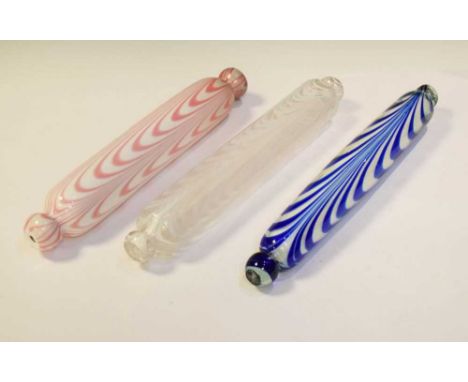 Three Victorian Nailsea-type glass rolling pins, each with typical festoon decoration, 43cm and smaller, (2)The white and cle