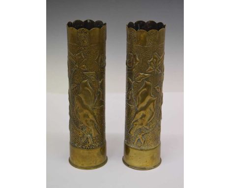 Pair of trench art vases depicting birds in a tree, 30cm high 