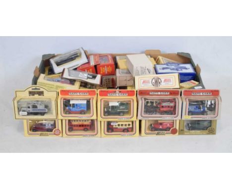 Quantity of fifty-nine boxed Lledo Days Gone diecast model vehicles to include The Royal Mail series, etc. 