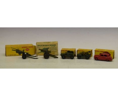 Dinky Toys - Four boxed diecast model vehicles comprising; 673 'Scout Car', 674 'Austin Champ', 161 'Austin Somerset Saloon' 