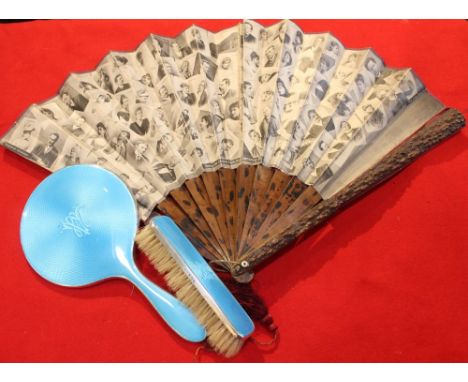 A late 19th century fan, printed with portraits of those involved in Opera, singers etc, also two Opera Theatres, on wooden s