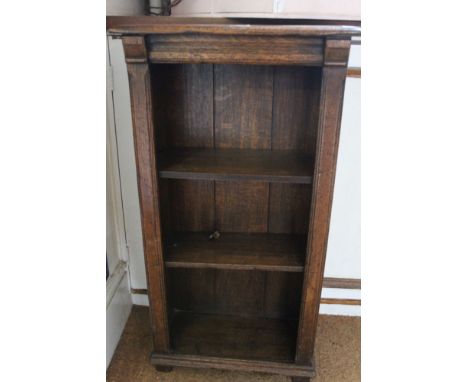 A dark oak small sized three shelf open bookcase. 49cm wide, 82cm high, 22cm deep (top). Condition: Stains to top, scratches,