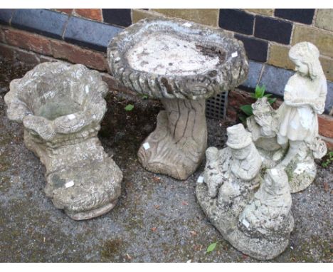 A small garden bird bath, together with a boot planter & two ornaments