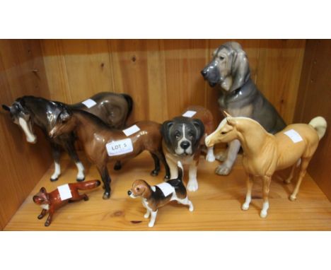 A shelf containing a selection of ceramic animal figurines including five Beswick examples Condition: sandy horse - one ear t